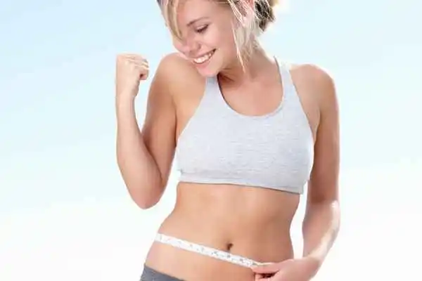 woman happy after fat reduction treatment Leicestershire