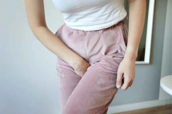 woman struggling with urine incontinence Leicestershire