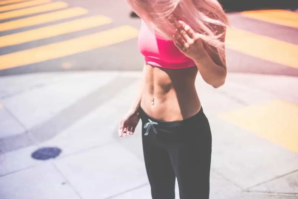 Woman with toned stomach after LA-EMS Body Sculpting Treatment Leicestershire